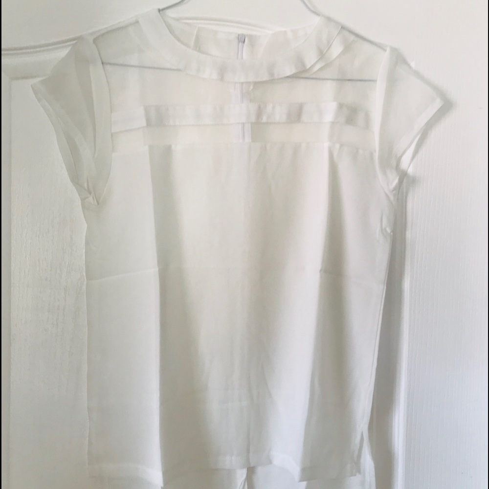 Nice White silk blouse Size L.